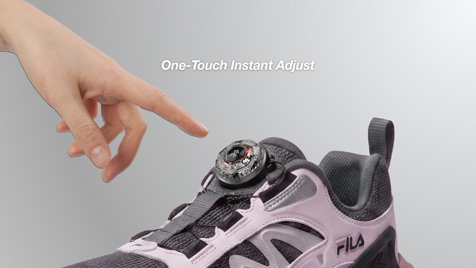 A finger presses the FILA sneaker dial — one-touch instant adjust.